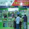Customers buying medicines at a retail pharmacy franchise medical shop with discount offers and stocked medicine shelves